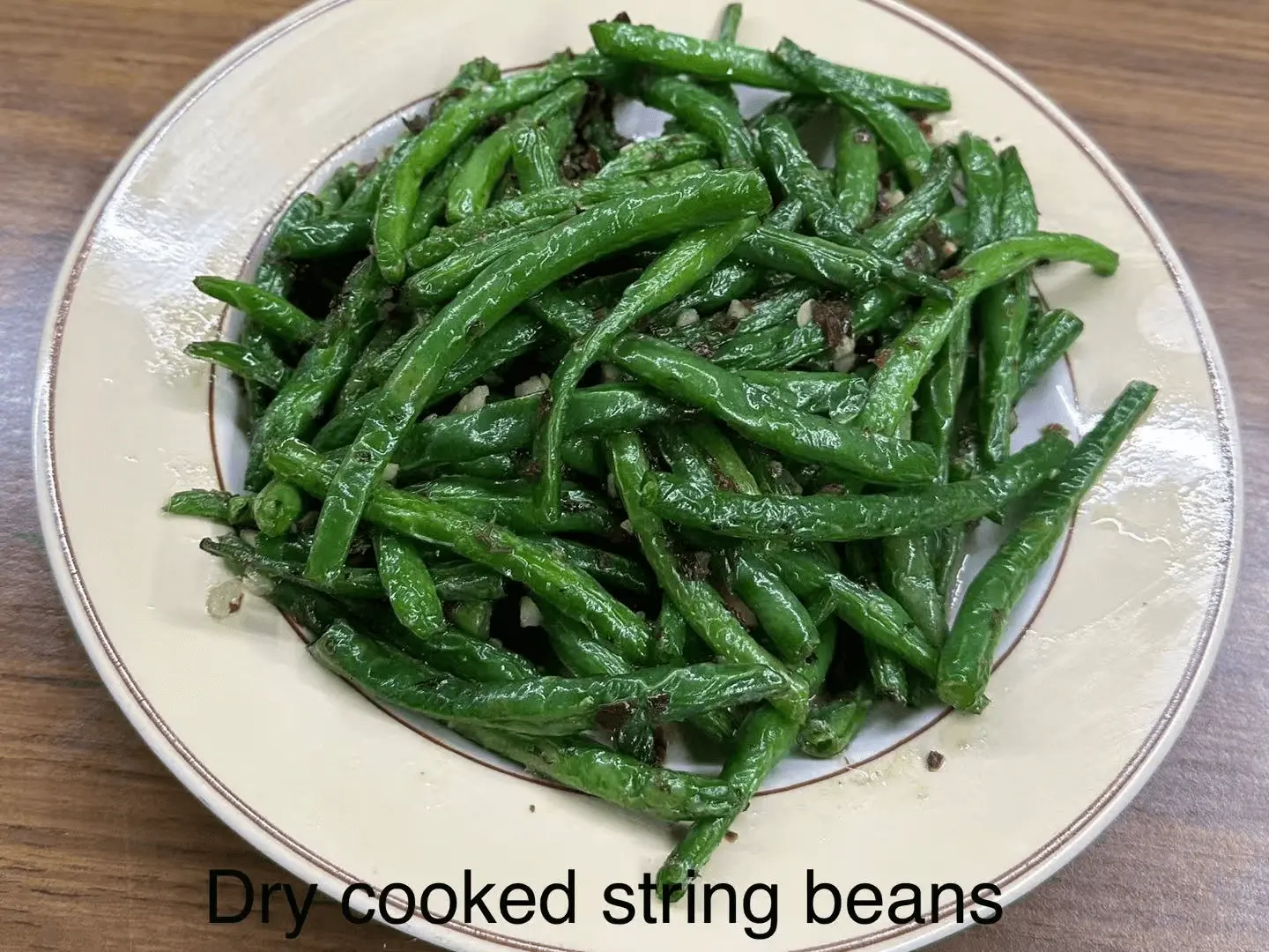 Tender string beans dry - cooked with garlic and spices at The Top Restaurant And Lounge, a Chinese Restaurant in Clinton